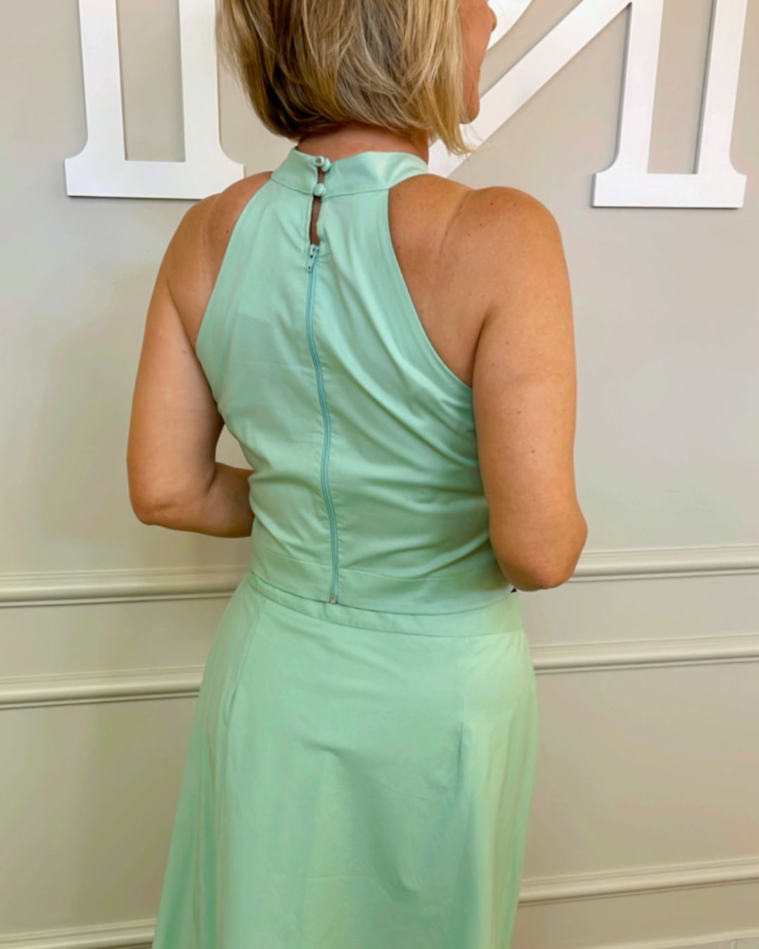 Conjunto cropped cava americana/saia midi verde