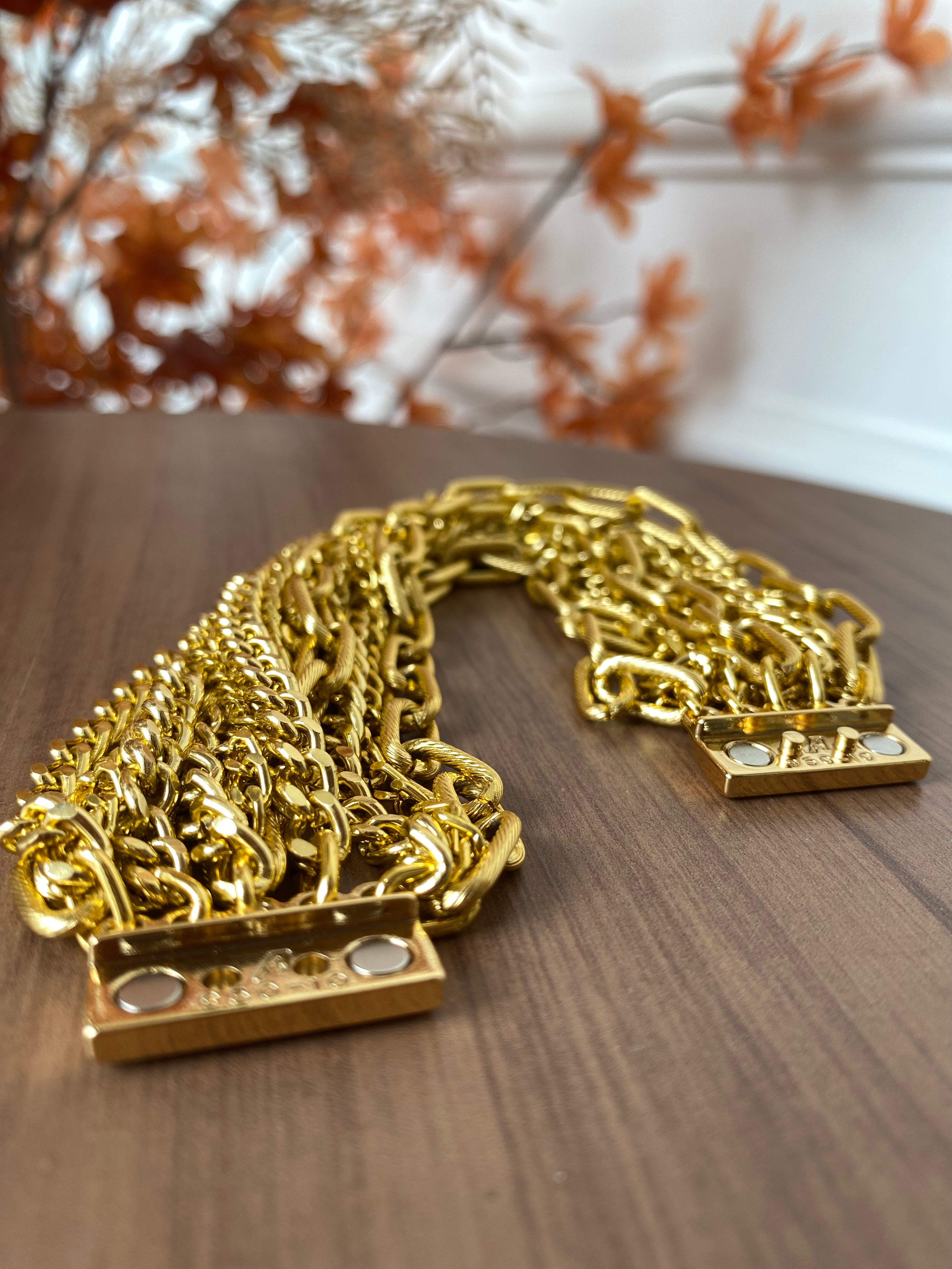 Pulseira corrente feche imã dourada